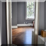 DM04. Wall mirror with silver-colored frame. 57”h x 33”w 